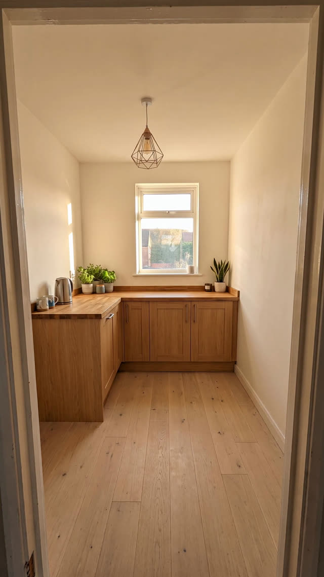 The same kitchen finished, from the exact same doorway